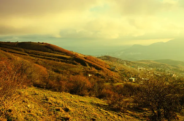 Rural landscape with sun rays — Stock Photo, Image