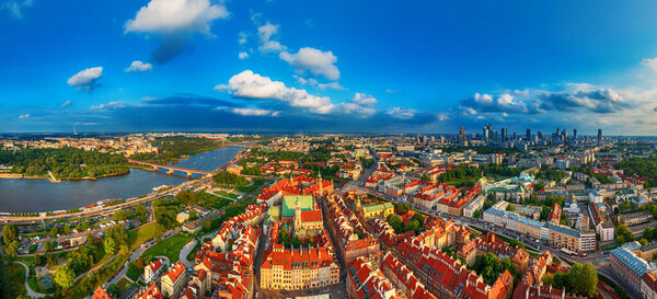 Old city in Warsaw with red roofs, Poland from above. Travel outdoor european background. Panoramic view with blue sky