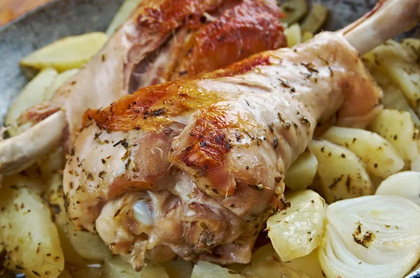 Turkey leg with baked  potatoes