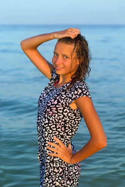 Attractive teen girl in wet dress — Stock Photo, Image