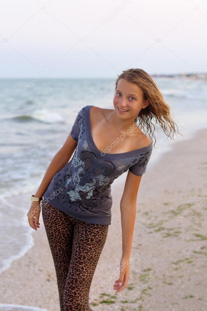 smiling girl in wet clothes