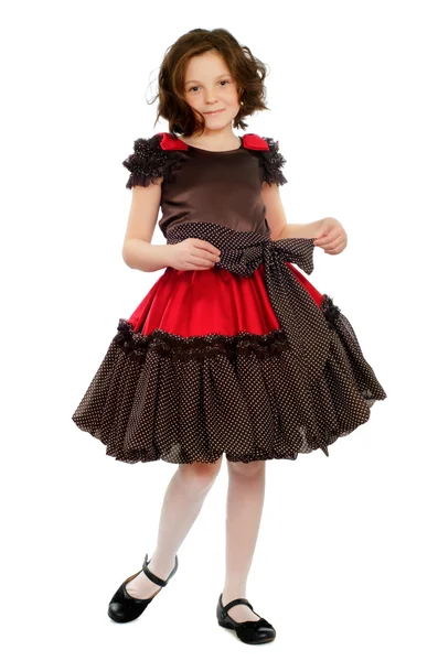 Schattig klein meisje in een jurk — Stockfoto