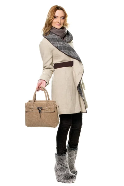 Young woman in a coat — Stock Photo, Image