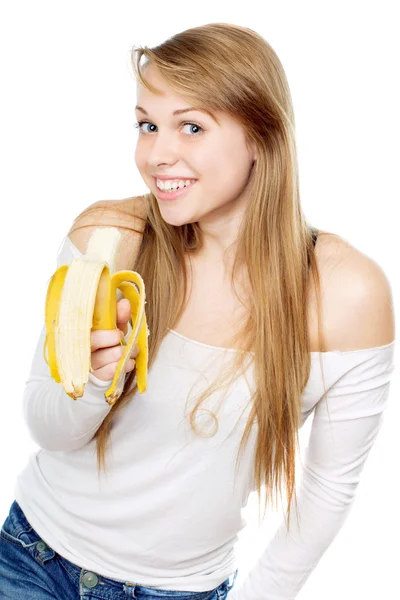 Femme ludique tenant banane — Photo