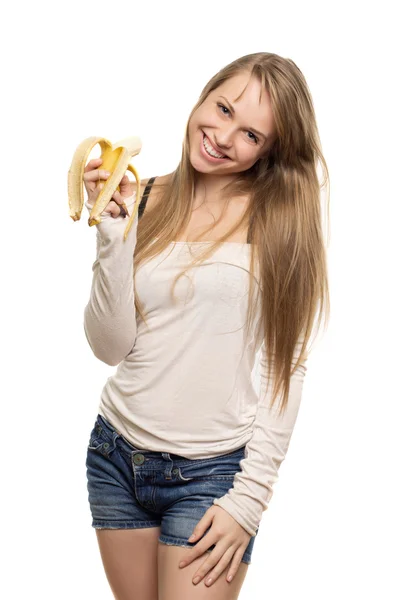 Beautiful woman holding banana — Stock Photo, Image