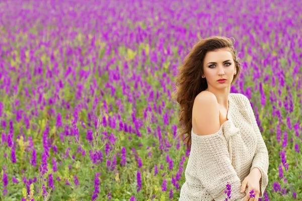 Young sexy curly brunette — Stock Photo, Image