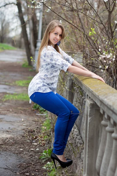 Playful young blond woman — Stock Photo, Image