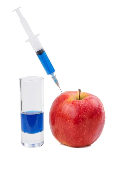Injection of red apple — Stock Photo, Image