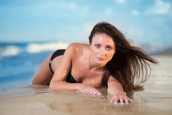 Pretty woman in black swimsuit — Stock Photo, Image