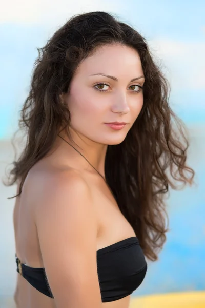 Portrait of curly young woman — Stock Photo, Image