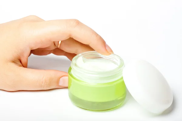 Moisturizer and female hand