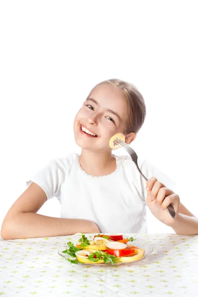 Young woman eating salad — Stock Photo, Image