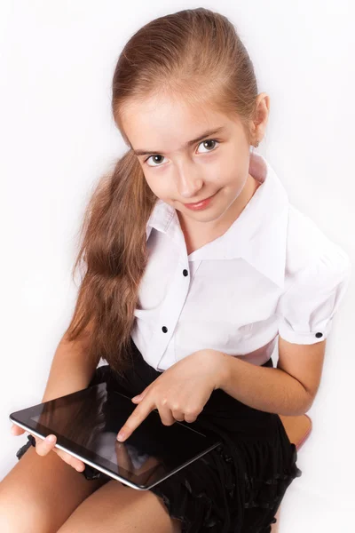 Girl with ipad like gadget — Stock Photo, Image