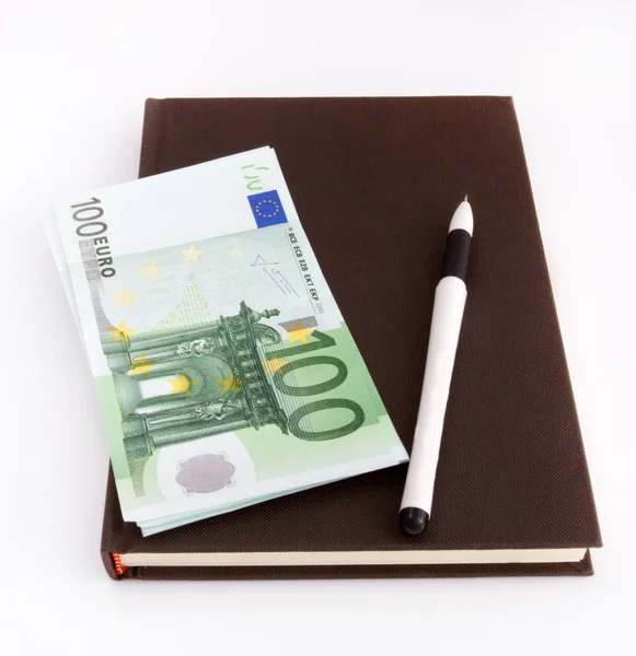 Banconote, taccuino e penna in euro — Foto Stock