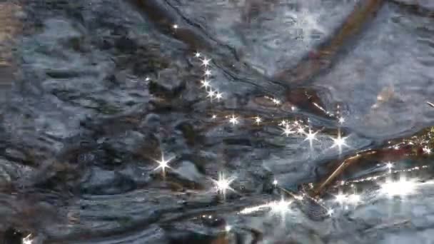 Solar patches of light on water. — Stock Video