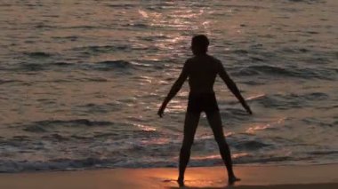 Yoga, deniz, şafak, gevşeme