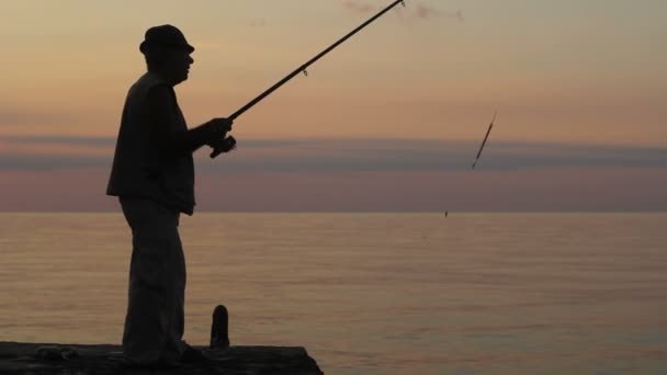 De visser, zonsondergang, zee, zon — Stockvideo