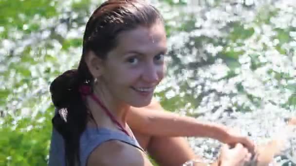Young woman in stream — Stock Video