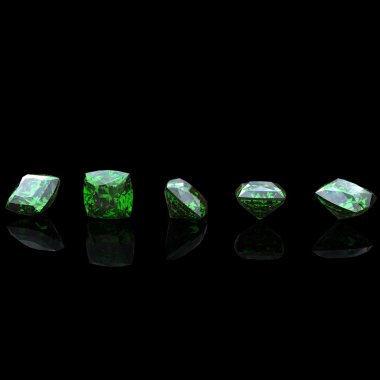 Gemstone on black background. Emerald. Peridot clipart