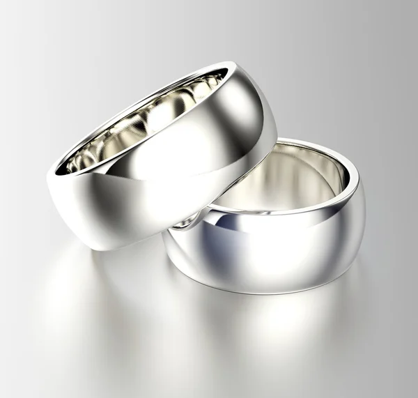 Серебряные свадебные кольца — стоковое фото