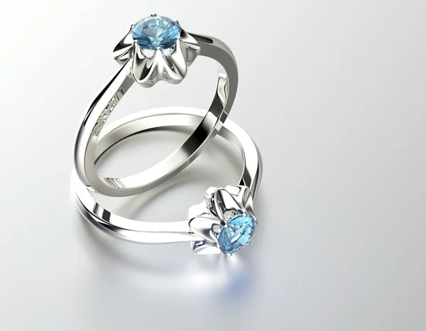 Кольца с голубым бриллиантом — стоковое фото