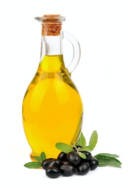bir kavanoz zeytin yağı ve Siyah Zeytin ile