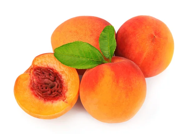 Sweet peaches with leafs — Stock Photo, Image