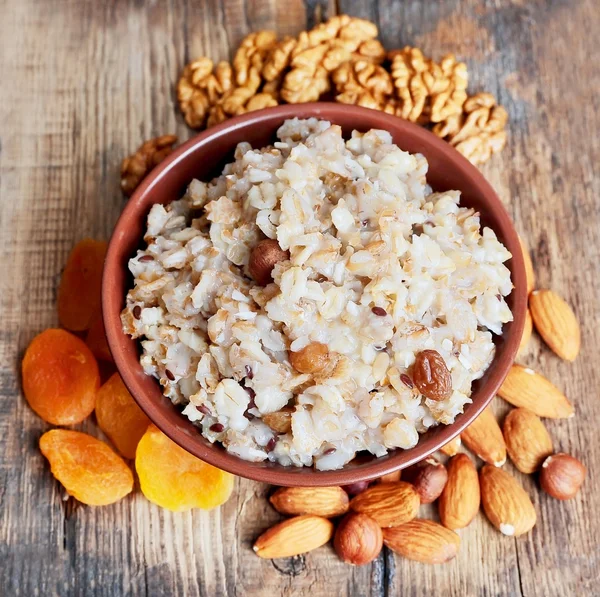 Porridge with nuts — Stock Photo, Image