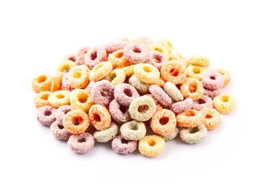 Kuru kahvaltı. Beyaz arka planda çok renkli halka pulu. Çocuk kahvaltısı. Hazır yemek..