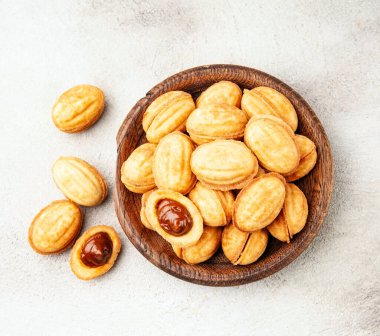 Cookies with topping on concrete backgrounds.