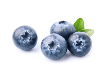 Sweet blueberries with leaves closeup.