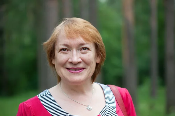 Outdoor portrait of mature woman — Stock Photo, Image