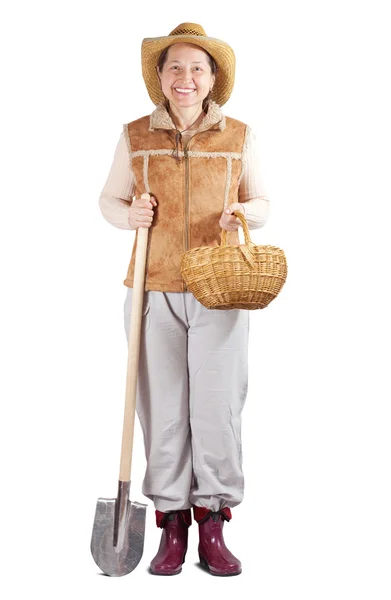 Šťastný famale farmář s rýčem — Stock fotografie
