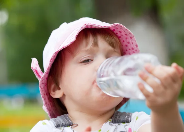 2 years baby drinks from bottle — Stock Photo, Image