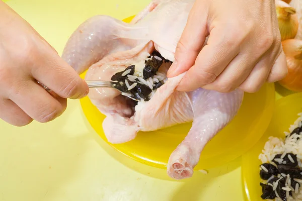 Closeup of stuffing chicken — Stock Photo, Image