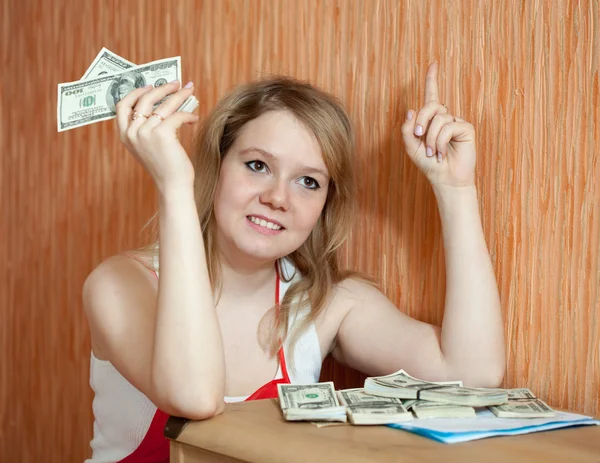 Woman decides on the financial problems — Stock Photo, Image