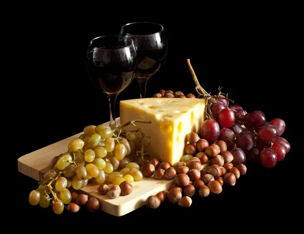 Uva e formaggio con bicchieri — Foto Stock
