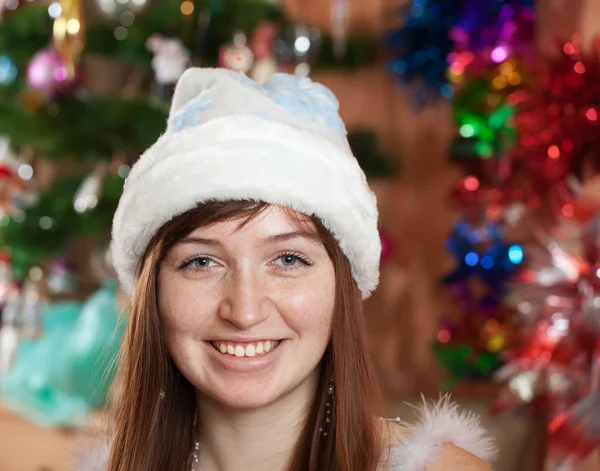 Portrait of girl in Christmas hat — Stock Photo, Image