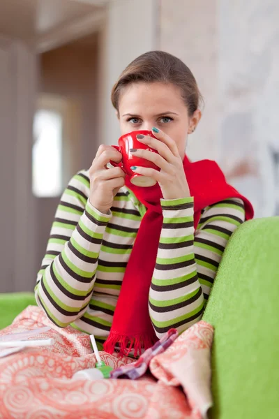 Illness woman with hot cup — Stock Photo, Image