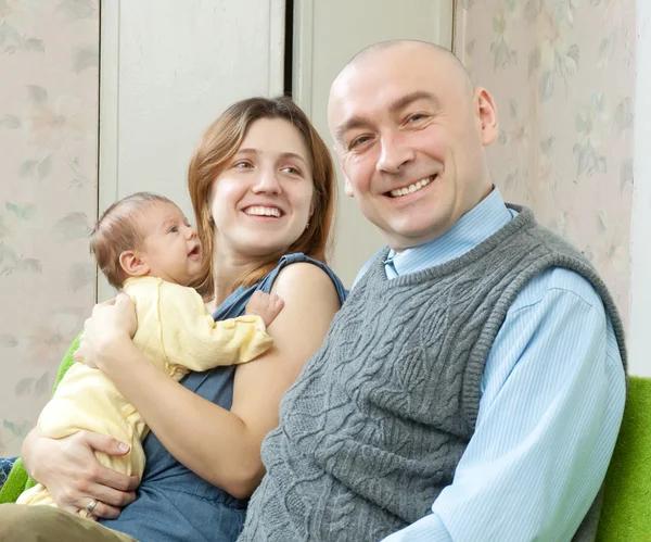 Smiling parents with newborn — Stock Photo, Image