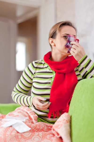 Sick woman uses handkerchief — Stock Photo, Image