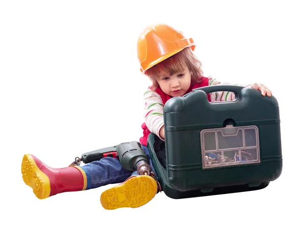 Child in hardhat with working tools — Stock Photo, Image