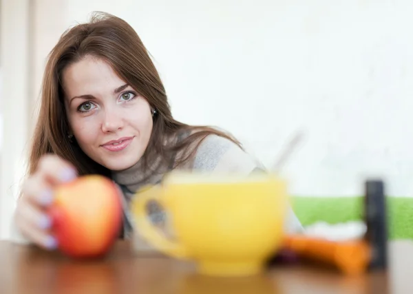 Long-haired brunette girl in home — Stock Photo, Image