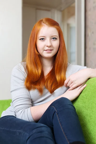 Red-haired tenager girl in home interior — Stock Photo, Image