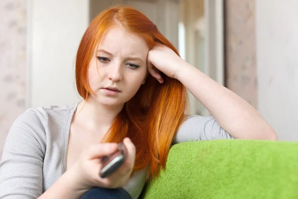 Menina de cabelos vermelhos com decepções — Fotografia de Stock