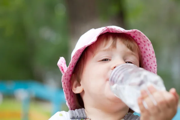 2 years child drinking from bottle — Stock Photo, Image