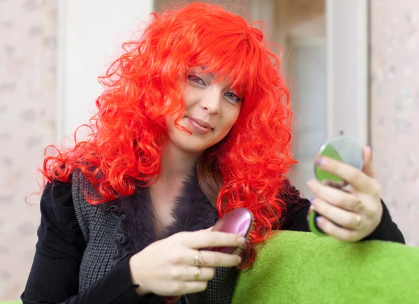 Woman in red wig — Stock Photo, Image