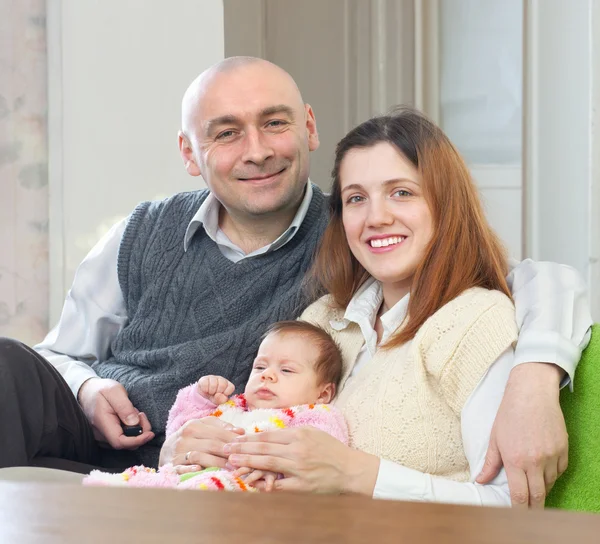 Família feliz de três — Fotografia de Stock