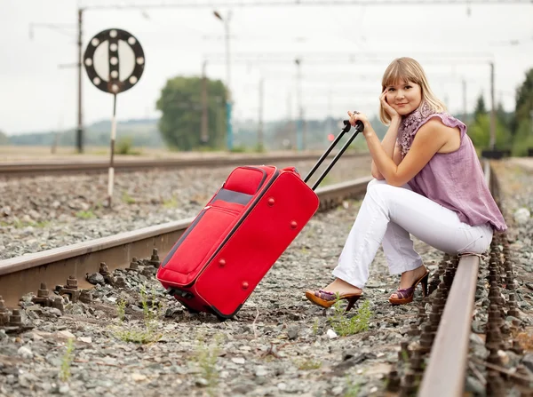 Frau mit Gepäck — Stockfoto