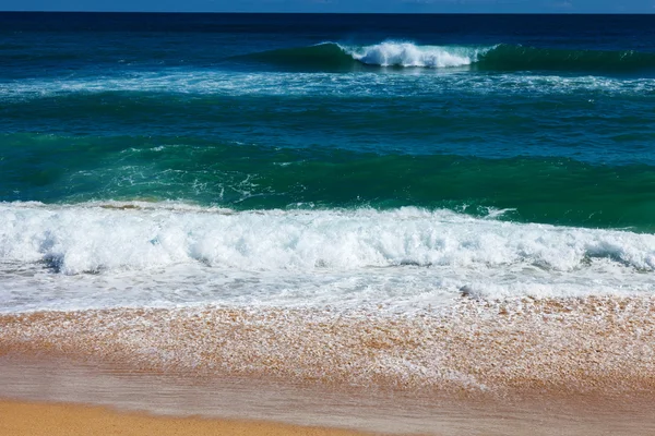 Sea wave on sand beach Royalty Free Stock Images